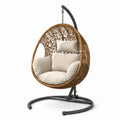 Hängesessel aus Rattan mit Stahlrahmen und Kissen, Braun/Beige